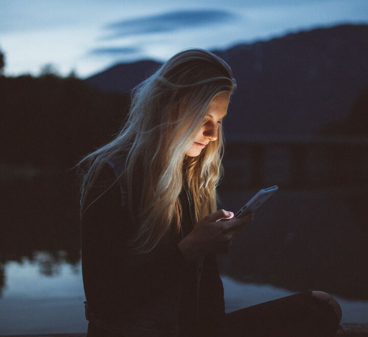 Koen Pauwels has researched apps (woman on phone pictured), to discover what makes customers buy products. Picture: Becca Tapert (unsplash)